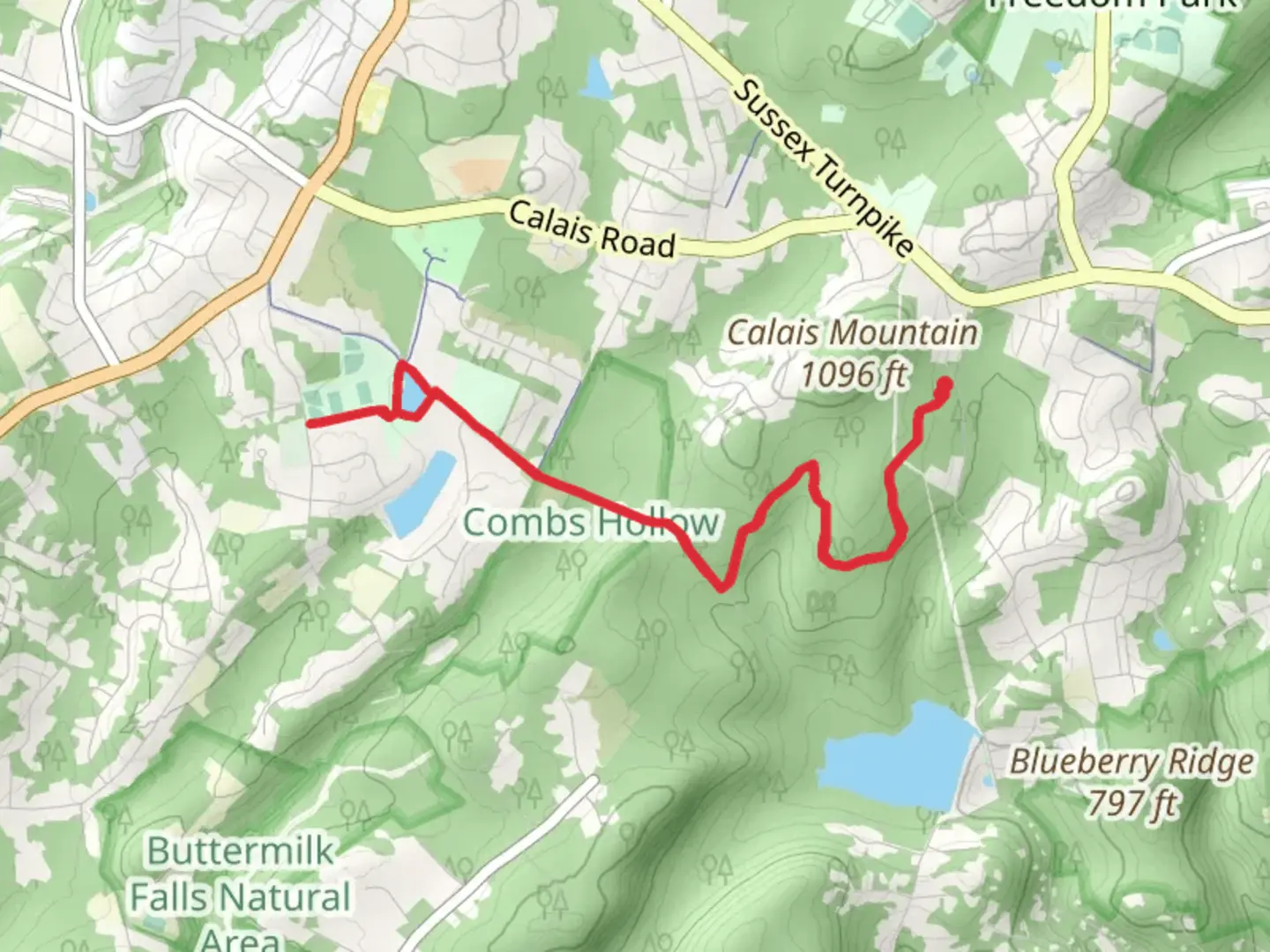 An image depicting the trail Heistein Pond via Patriots Path and its surrounding area.