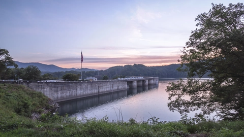 An image depicting the trail Lakeshore Trail via Fontana Dam and its surrounding area.