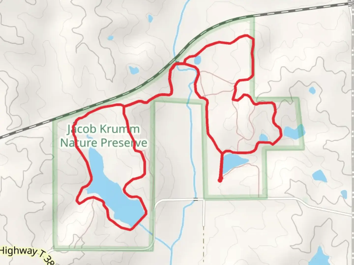An image depicting the trail Sugar Creek Loop in Jacob Krumm Nature Preserve and its surrounding area.