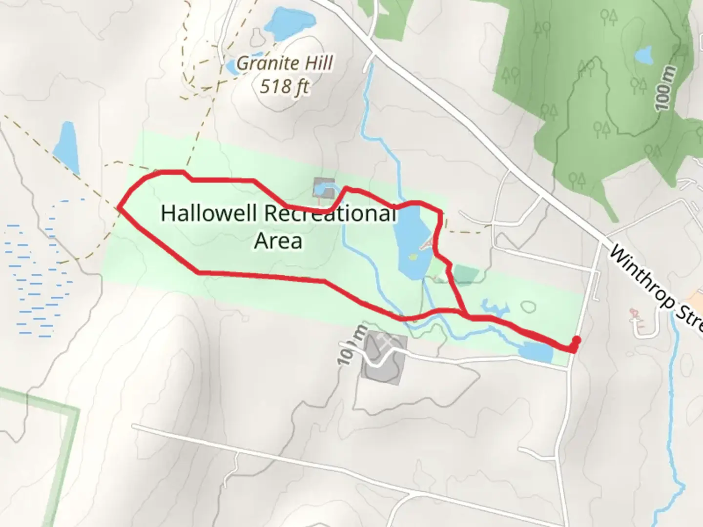 An image depicting the trail Hallowell Reservoir via Quarry Trail and its surrounding area.