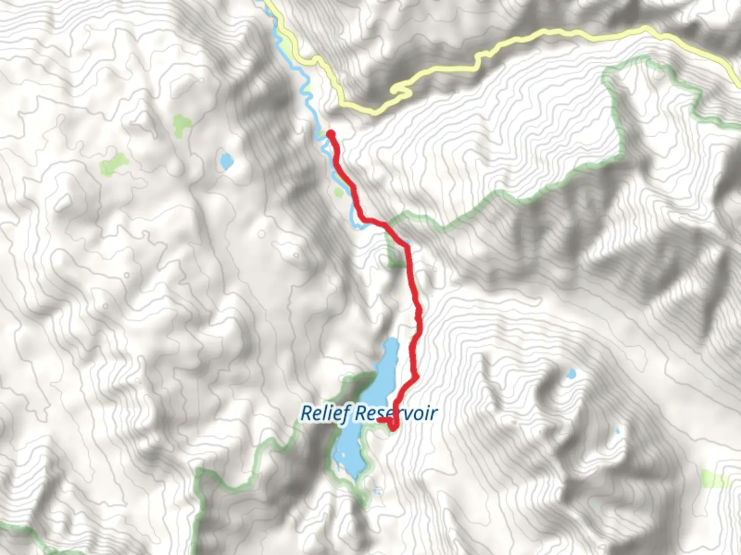 An image depicting the trail Relief Reservoir via Huckleberry Trail and its surrounding area.