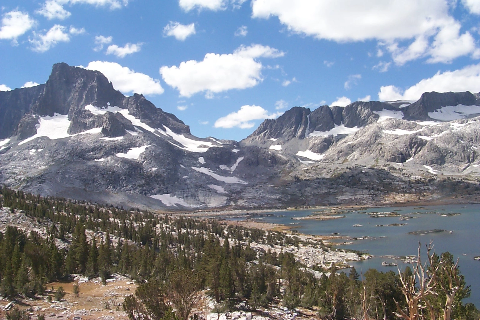 An image depicting the trail Olaine Lake and Waugh Lake via PCT and John Muir Trail Loop and its surrounding area.