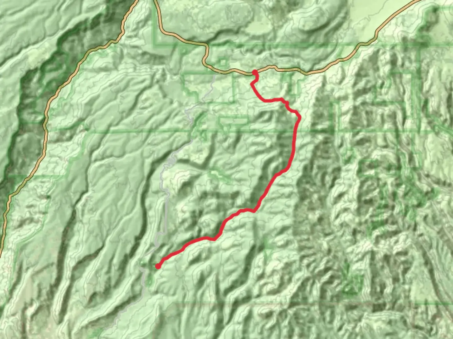 An image depicting the trail Paliza Canyon Road and its surrounding area.