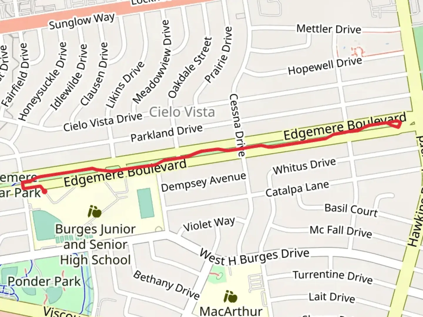 An image depicting the trail Edgemere Linear Park and its surrounding area.