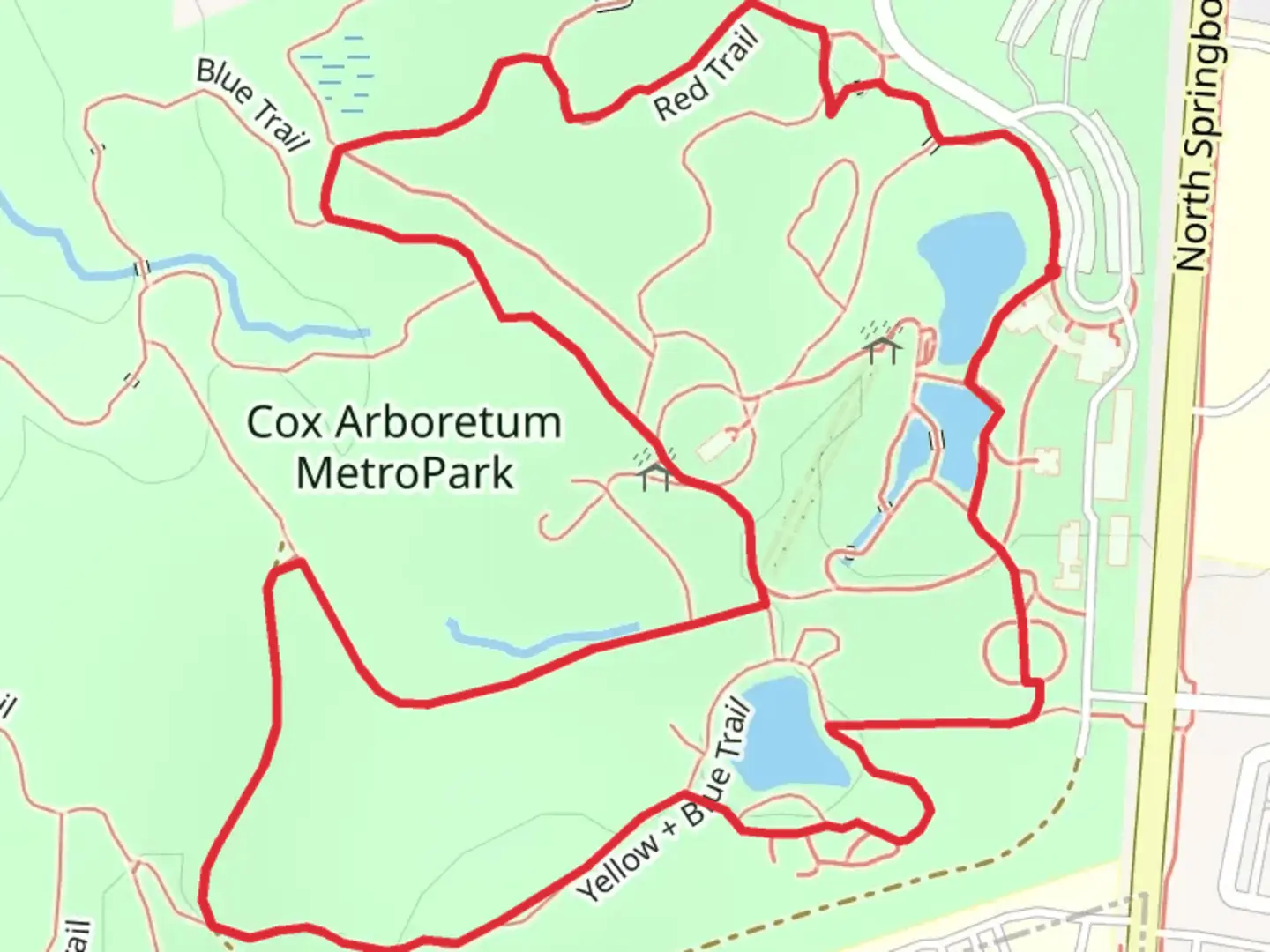 An image depicting the trail Cox Arboretum MetroPark Loop and its surrounding area.