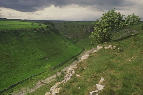 An image depicting the trail Monyash to Youlgreave Loop via River Lathkill and its surrounding area.