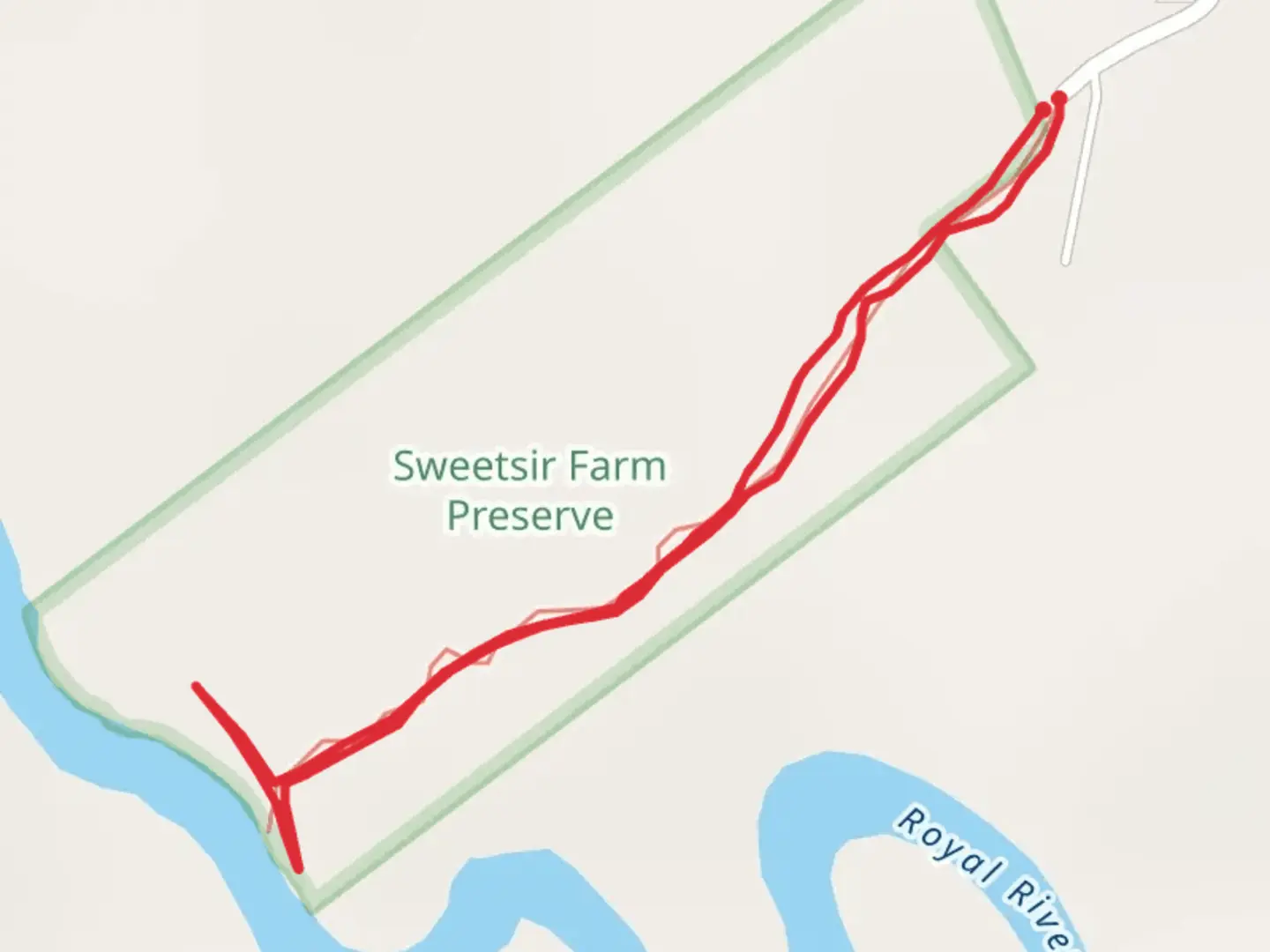 An image depicting the trail Royal River from Old Field Road and its surrounding area.