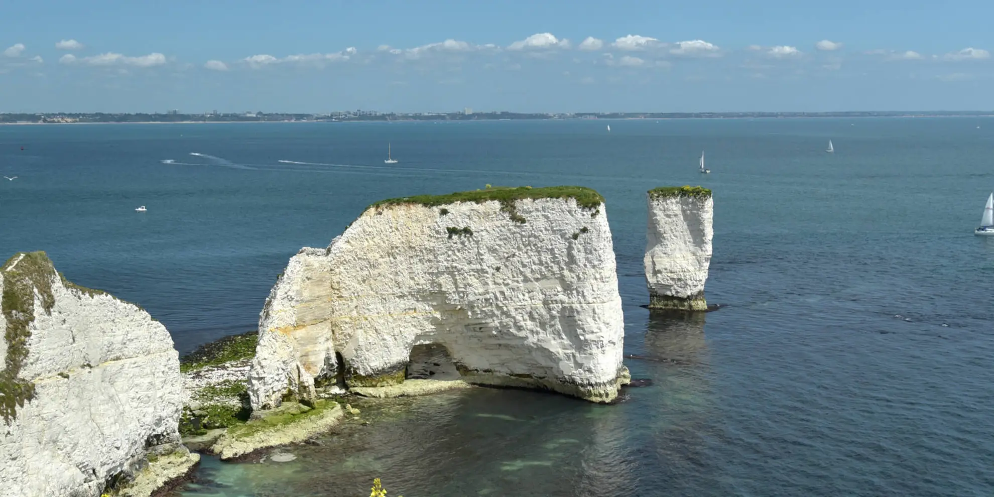 An image depicting the trail Agglestone and Old Harry Rocks from Studland and its surrounding area.
