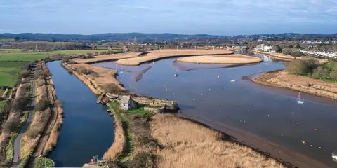 An image depicting the trail Avocet Line - Topsham Station to Powderham and Starcross Walk and its surrounding area.