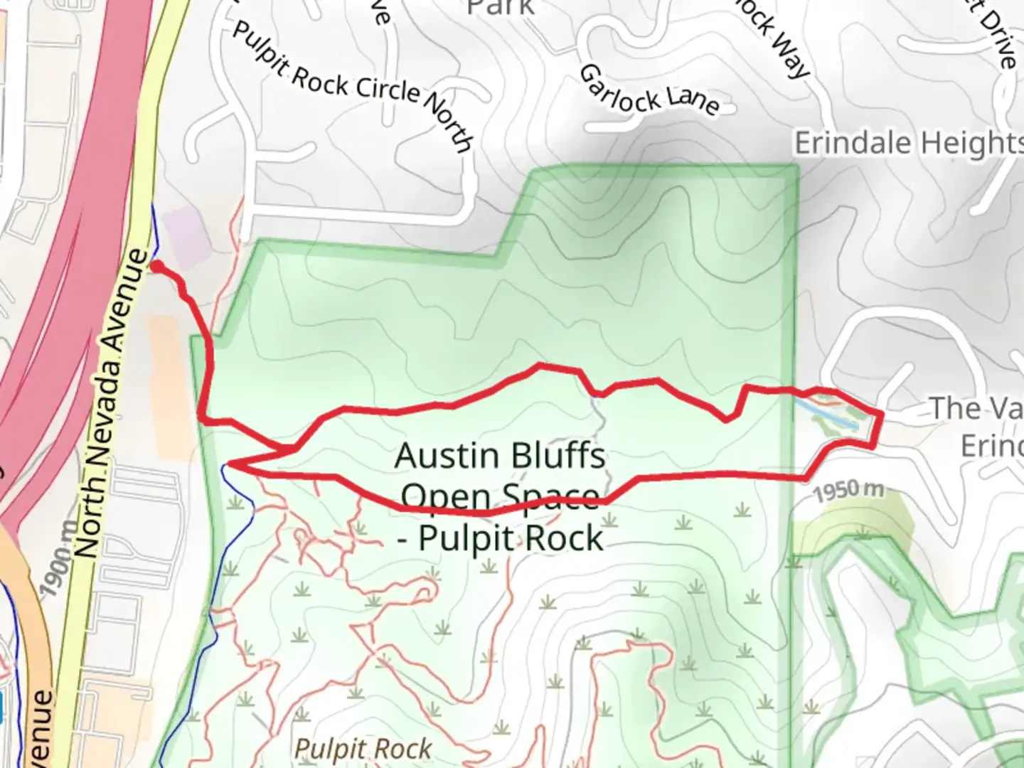 An image depicting the trail Austin Bluffs Loop Trail and its surrounding area.