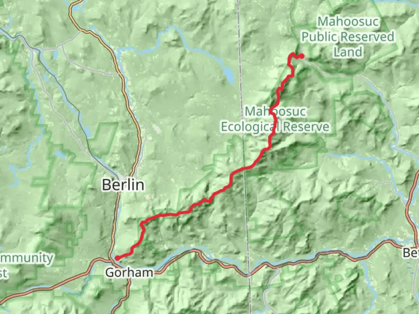 An image depicting the trail Mount Carlo and Mahoosuc Arm Trail and its surrounding area.