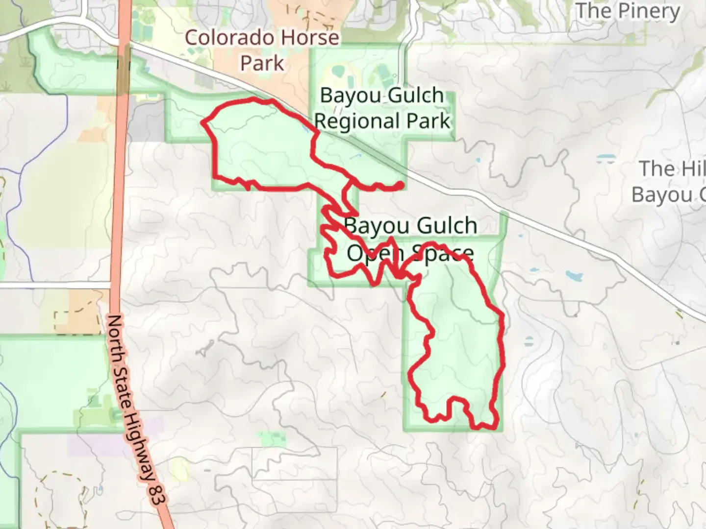 An image depicting the trail Bayou Gulch Open Space Trail and Two Bridges Trail and its surrounding area.