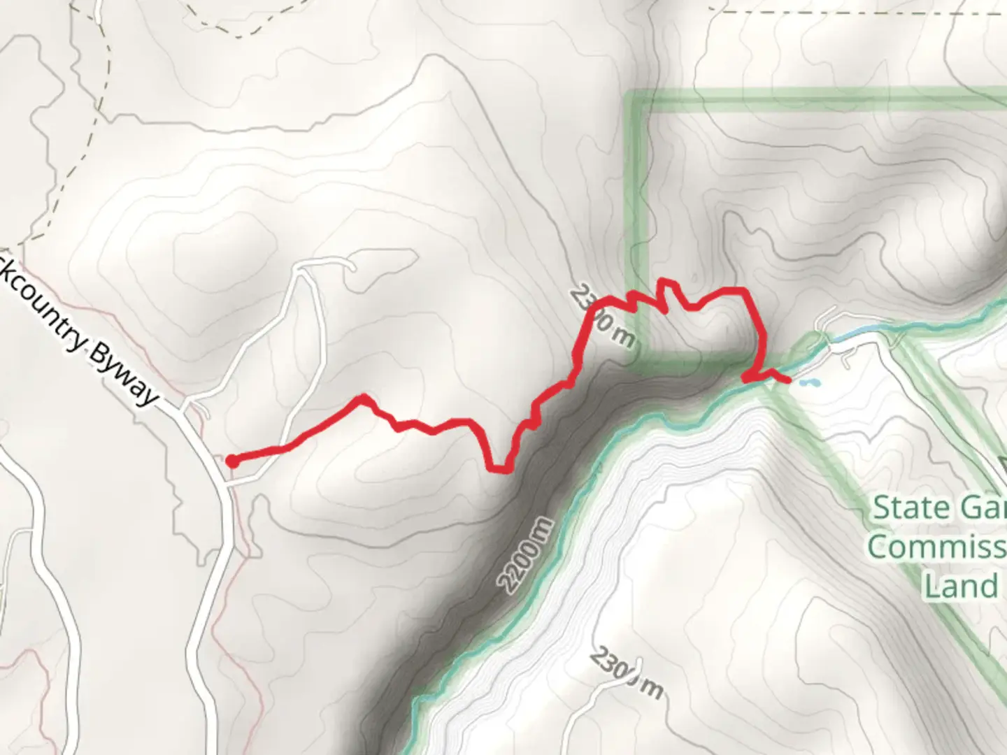 An image depicting the trail Red River via Pescado Trail and its surrounding area.
