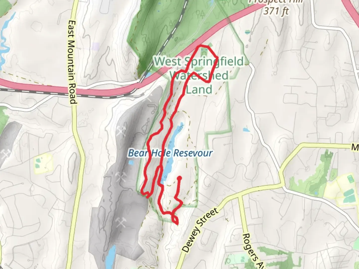 An image depicting the trail Bearhole Reservoir via Metacomet Monadnock Trail and its surrounding area.