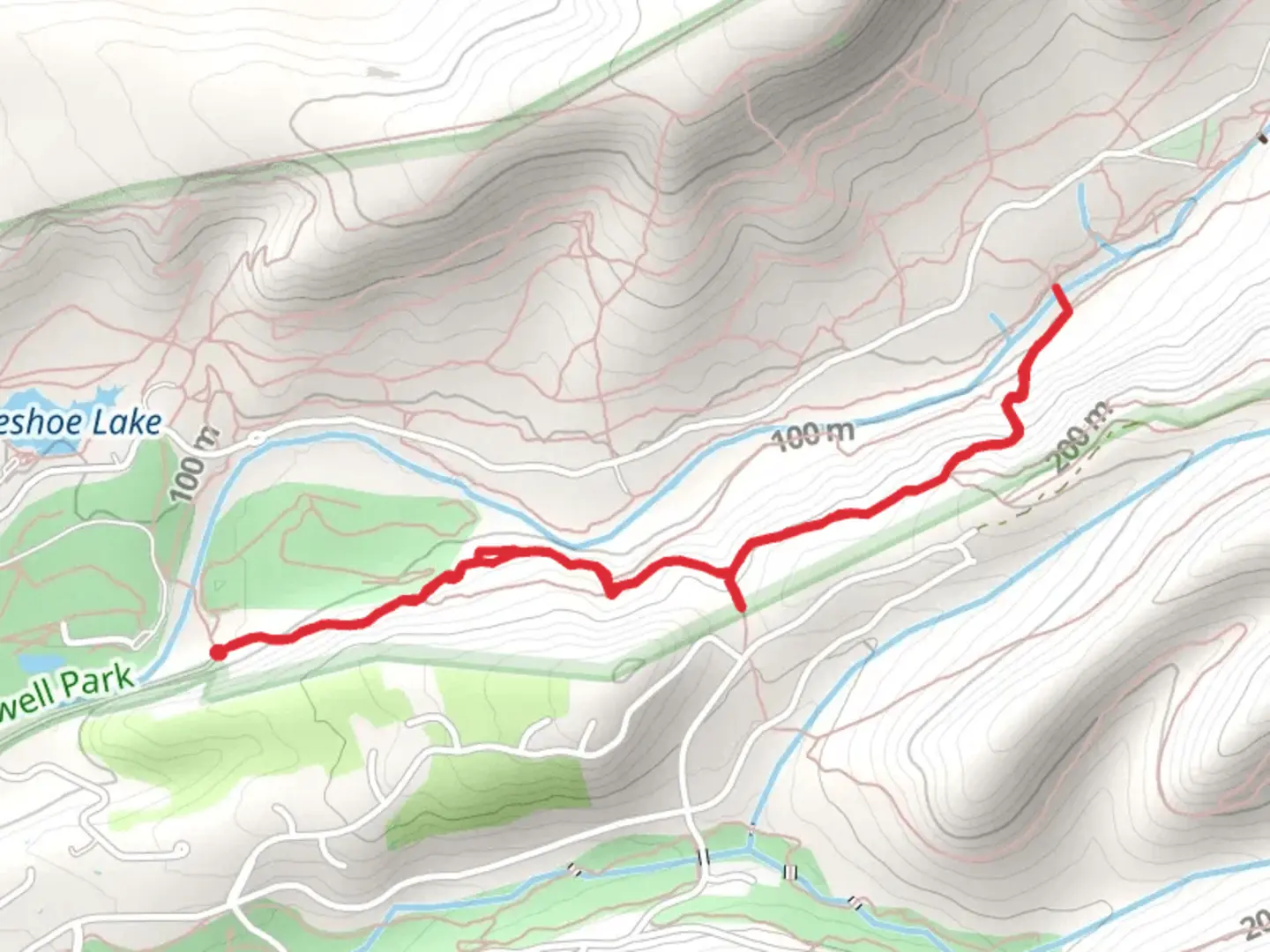 An image depicting the trail South Rim Trail from Centennial Avenue and its surrounding area.