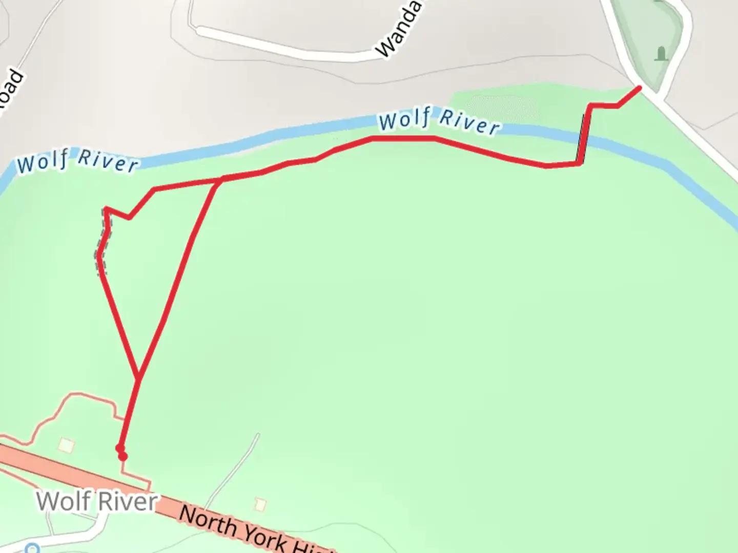 An image depicting the trail Wolf River side Walk and its surrounding area.