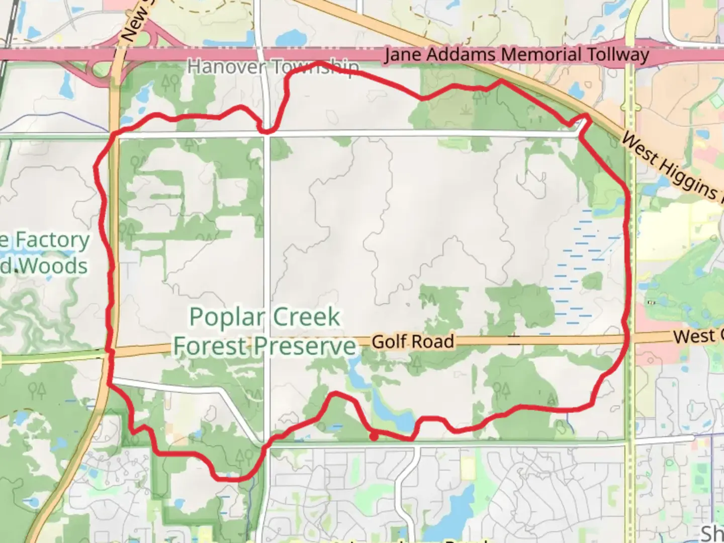 An image depicting the trail Poplar Creek Red Paved Loop Trail and its surrounding area.