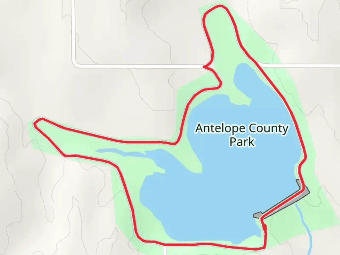 An image depicting the trail Antelope County Lake Loop and its surrounding area.
