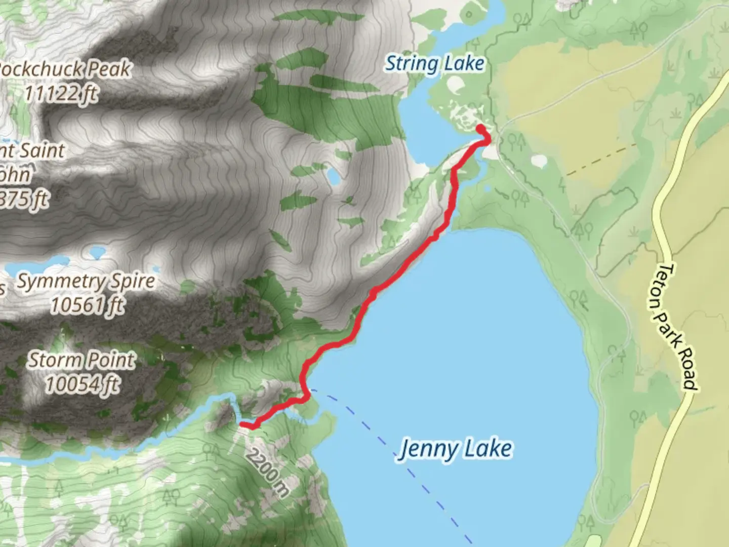 An image depicting the trail Hidden Falls - Jenny Lake and its surrounding area.