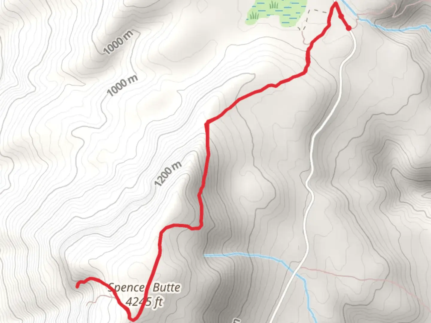 An image depicting the trail Spencer Arch Trail via Spencer Butte and its surrounding area.