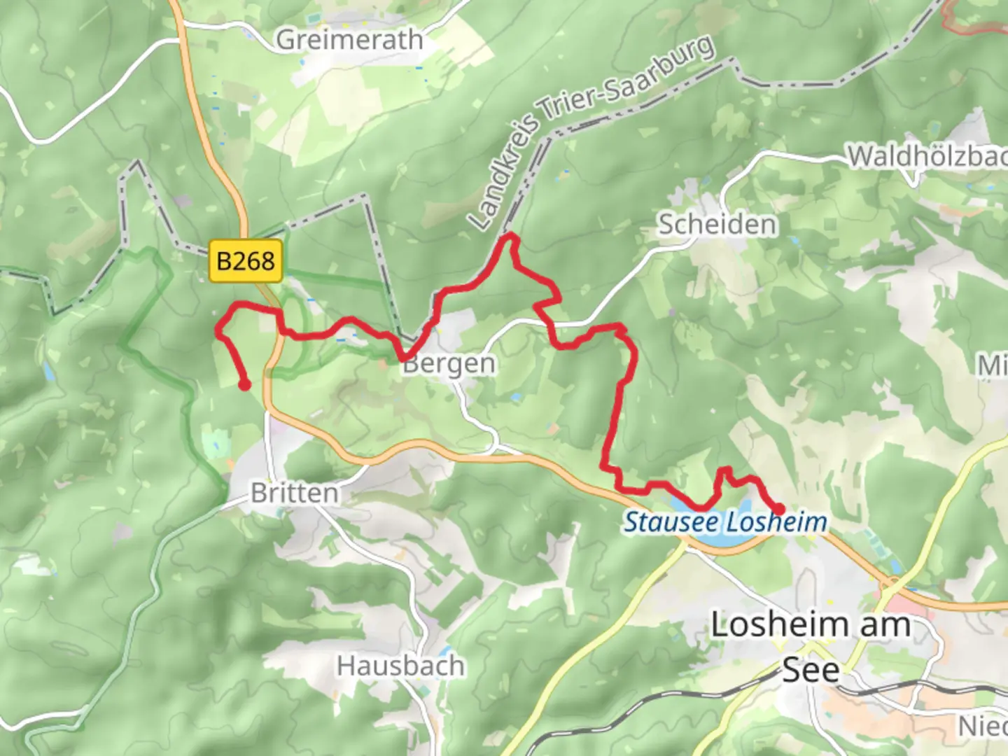 An image depicting the trail Stausee Losheim via Der Bergener and its surrounding area.