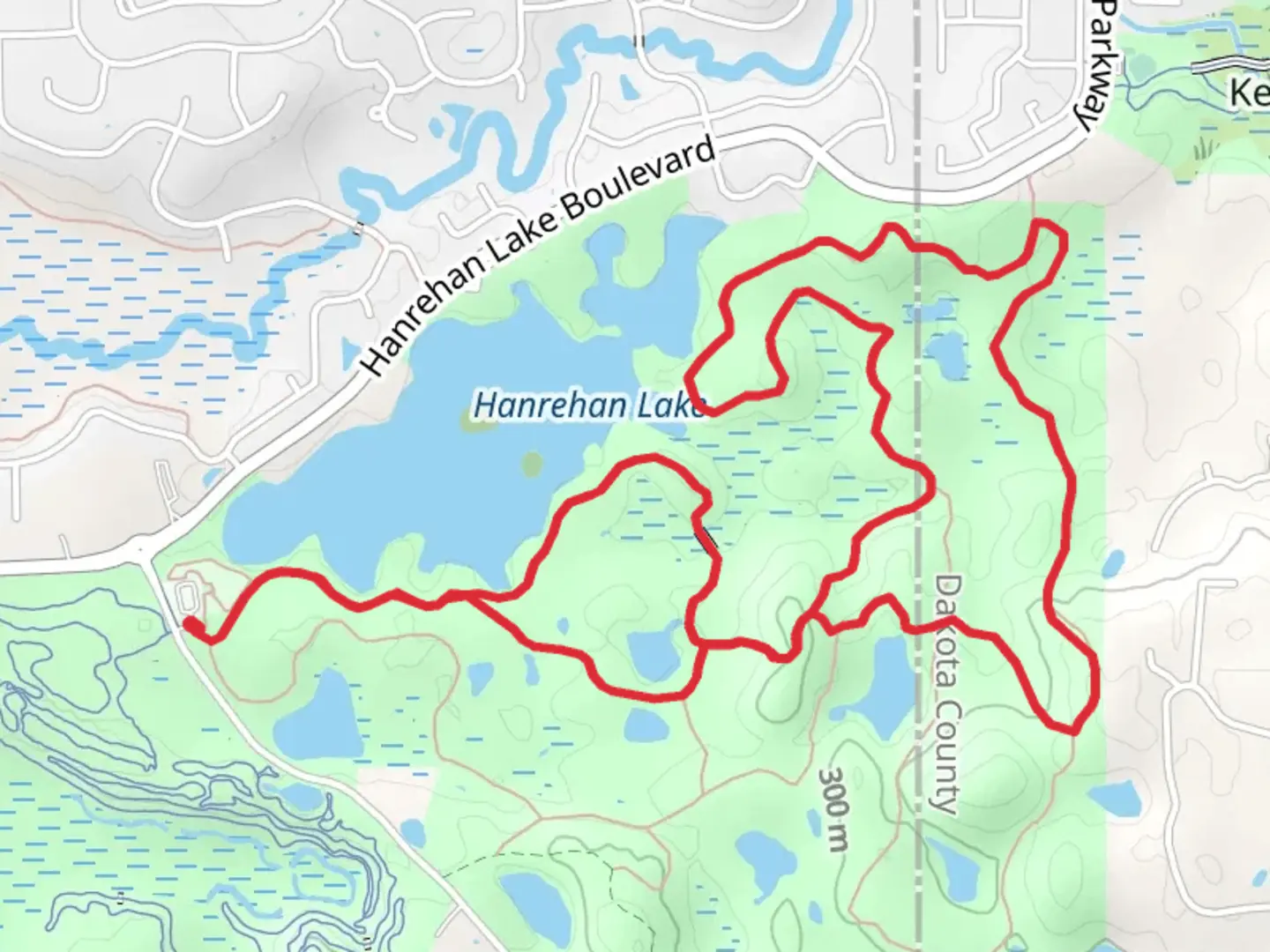 An image depicting the trail Hanrehan Lake Shore Loop - East and its surrounding area.
