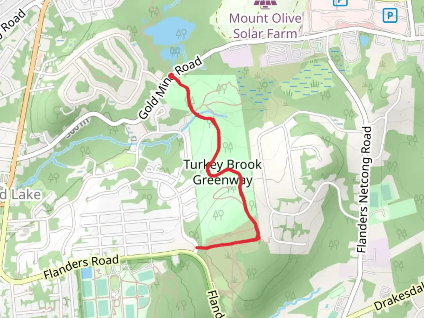An image depicting the trail Gold Mine Road South Walk and its surrounding area.