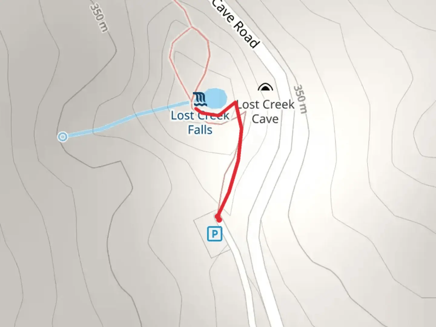 An image depicting the trail White's Cave Road and its surrounding area.
