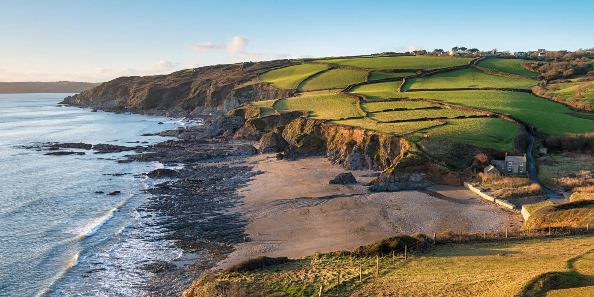 An image depicting the trail Dodman Point Walk and its surrounding area.