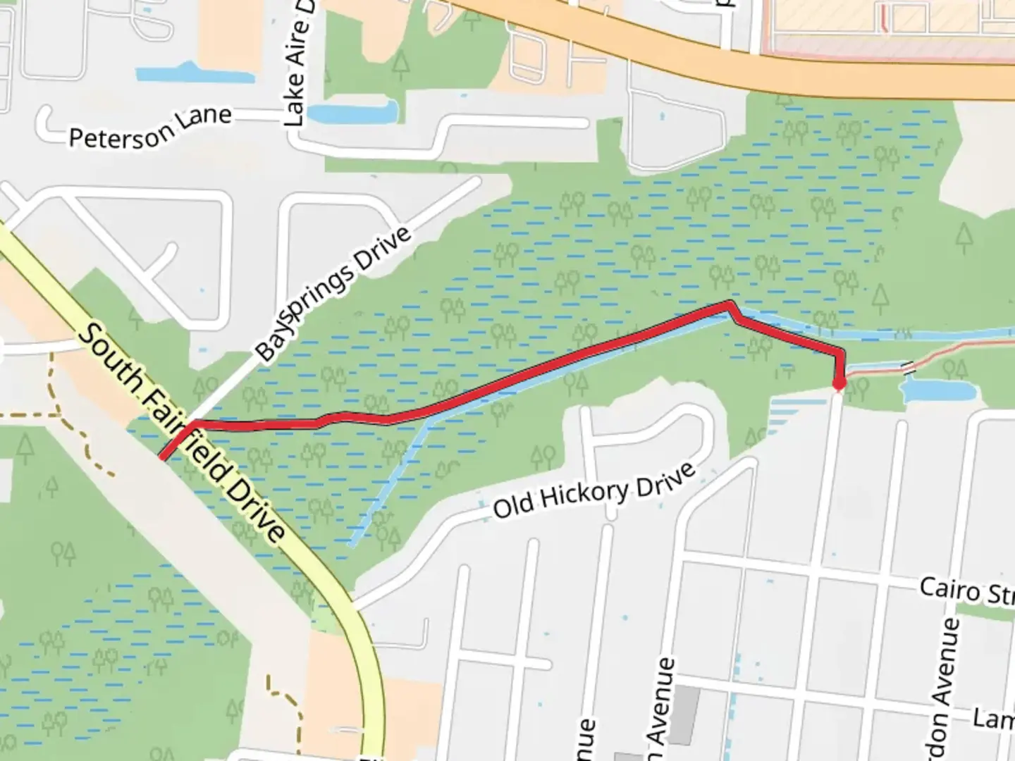 An image depicting the trail Southwest Greenway and its surrounding area.