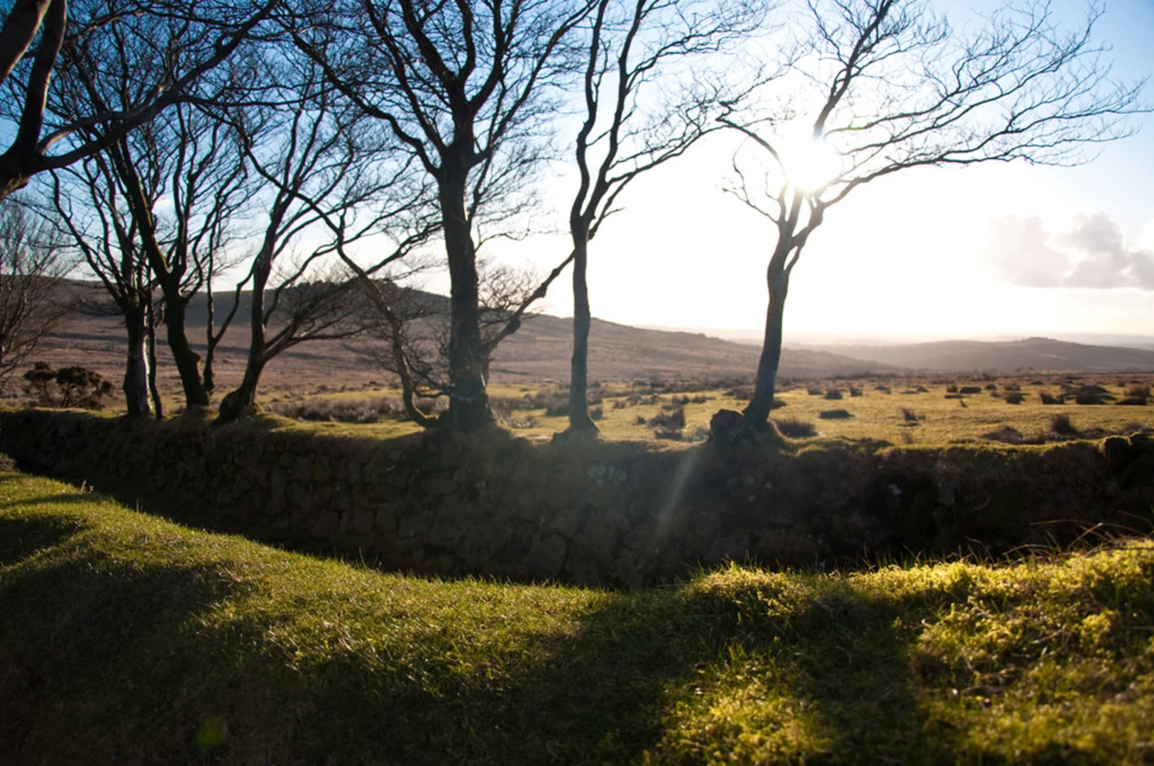 An image depicting the trail Hucken Tor Loop - Merrivale and its surrounding area.