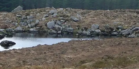 An image depicting the trail New Village - Lough Seecon Trail and its surrounding area.