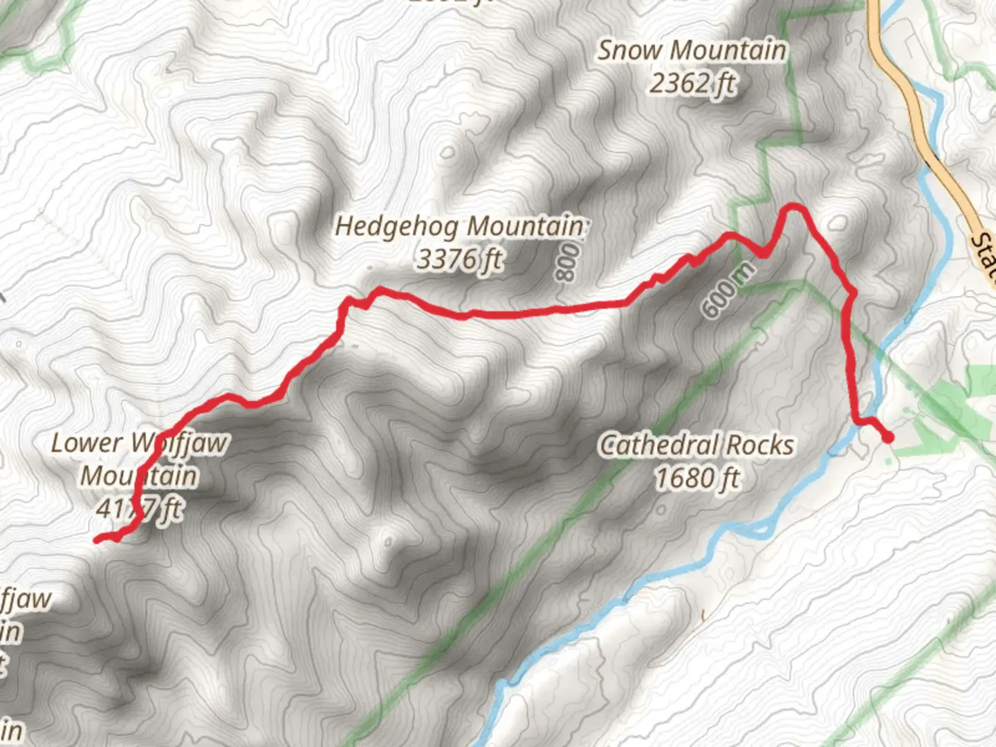 An image depicting the trail Wolf Jaw Notch via WA White Trail and its surrounding area.