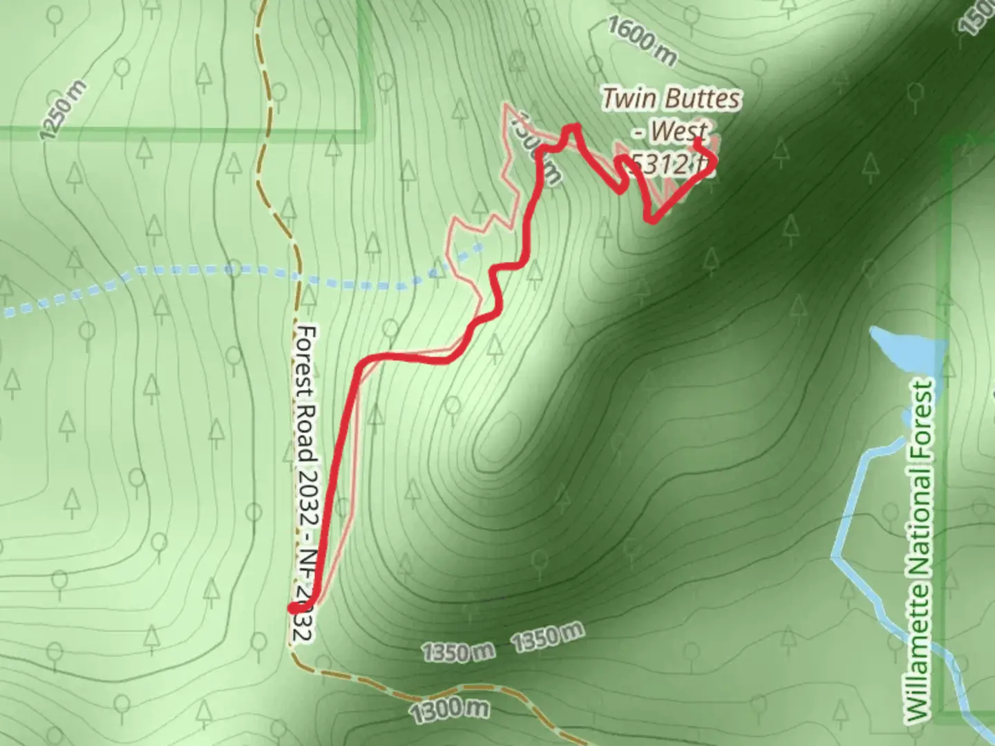 An image depicting the trail Twin Buttes Trail and its surrounding area.