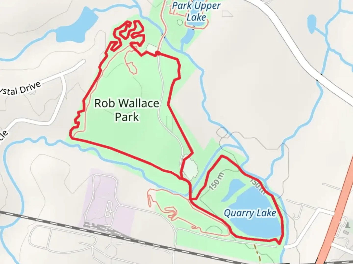 An image depicting the trail Rob Wallace Park Field and Quarry Lake Loop and its surrounding area.