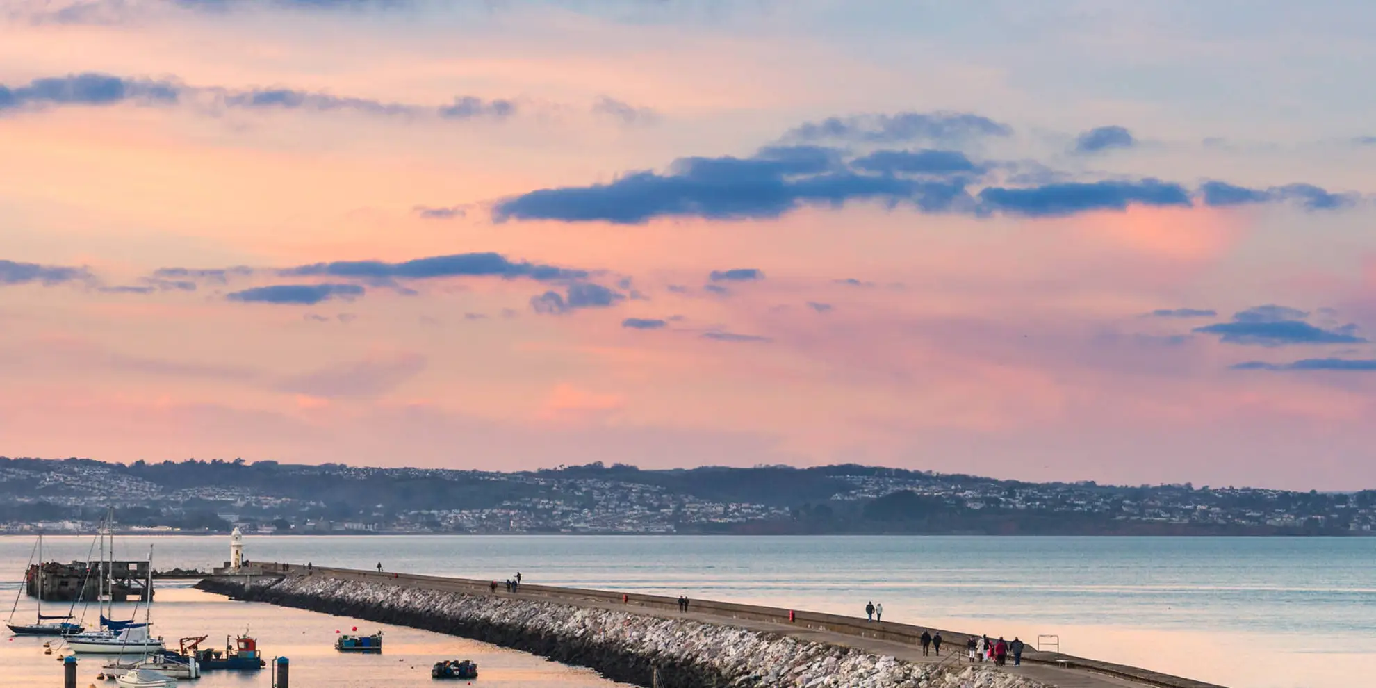 An image depicting the trail Brixham Breakwater Walk and its surrounding area.