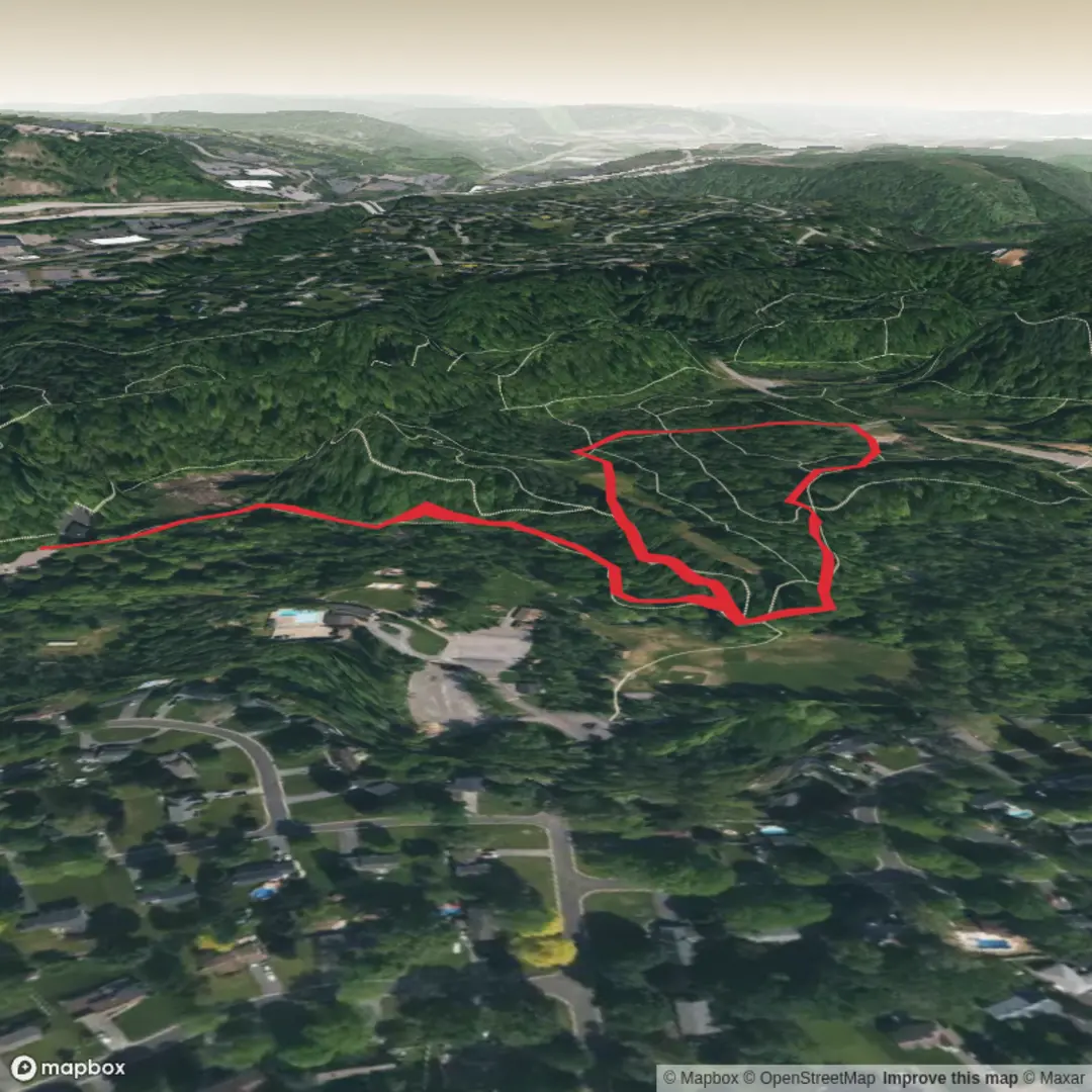 An image depicting the trail Irondequoit Creek via Powder Horn Trail and its surrounding area.