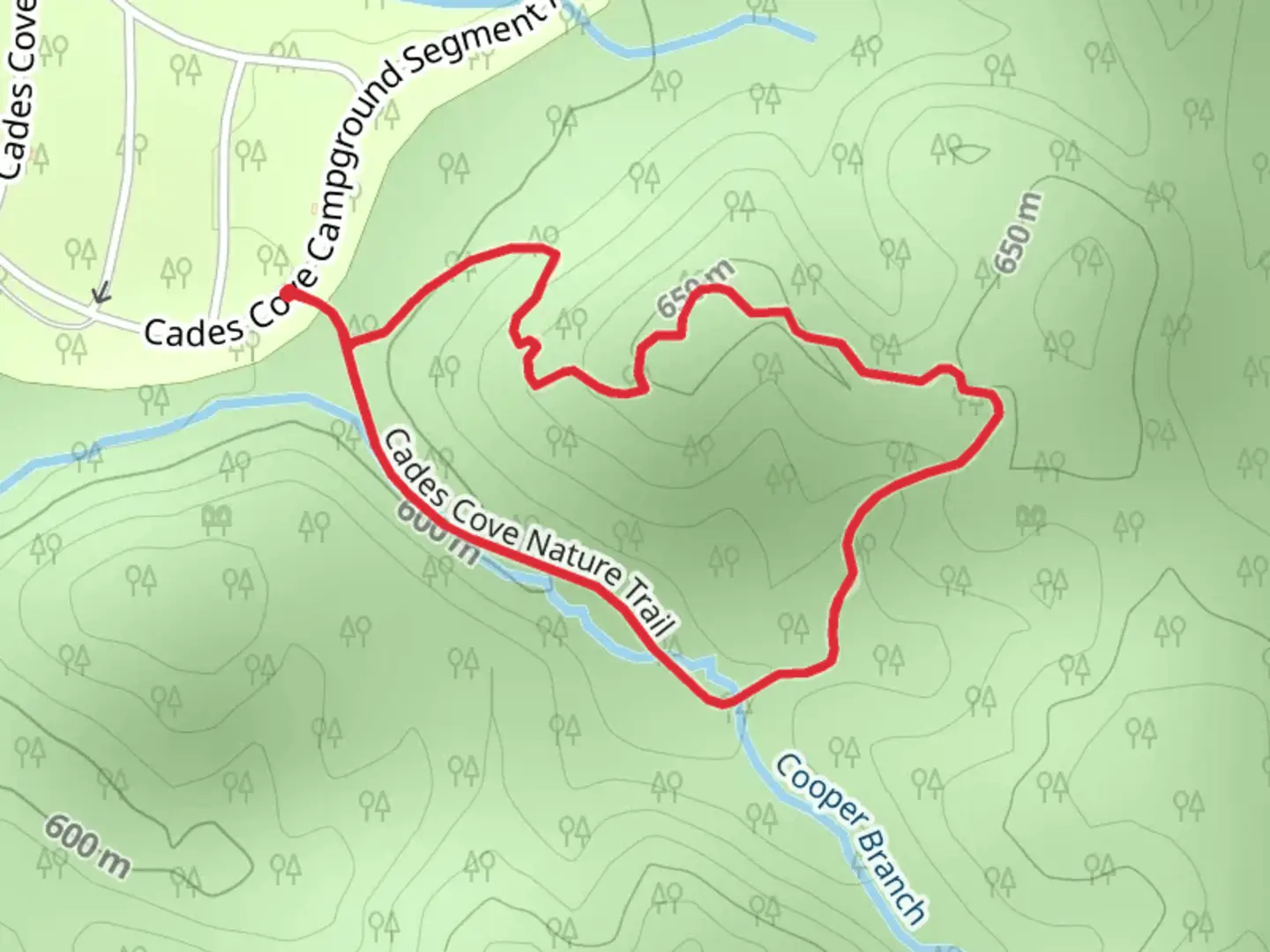 An image depicting the trail Cades Cove Nature Loop Trail and its surrounding area.