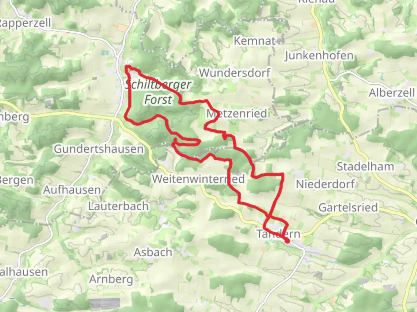 An image depicting the trail Tandern to Schiltberg Loop via Schiltberger Forst and its surrounding area.