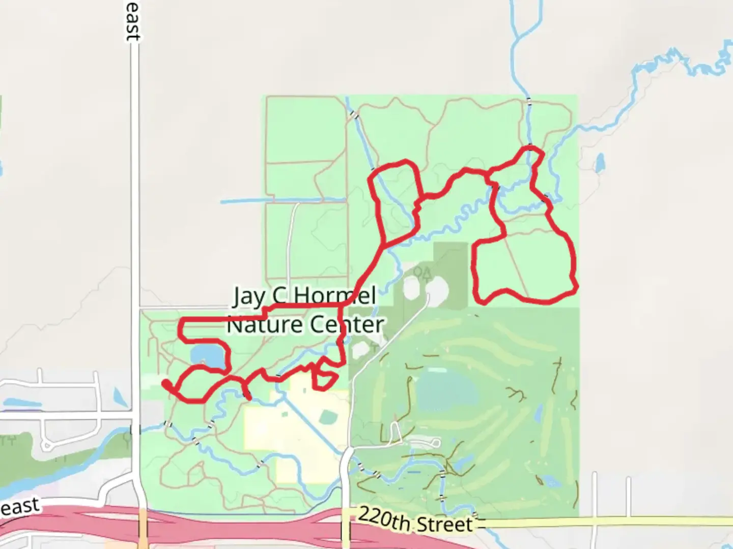 An image depicting the trail Pine, Lone Oak, Big Bluestem and Pond Loop and its surrounding area.