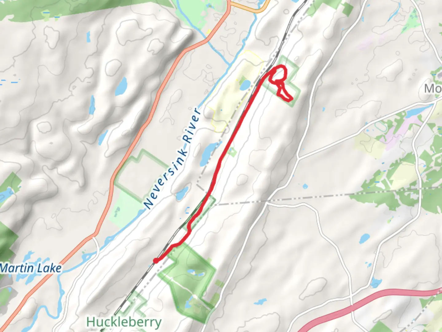 An image depicting the trail Shawangunk Mountain and Gutmard Lake from Sin Hollow and its surrounding area.