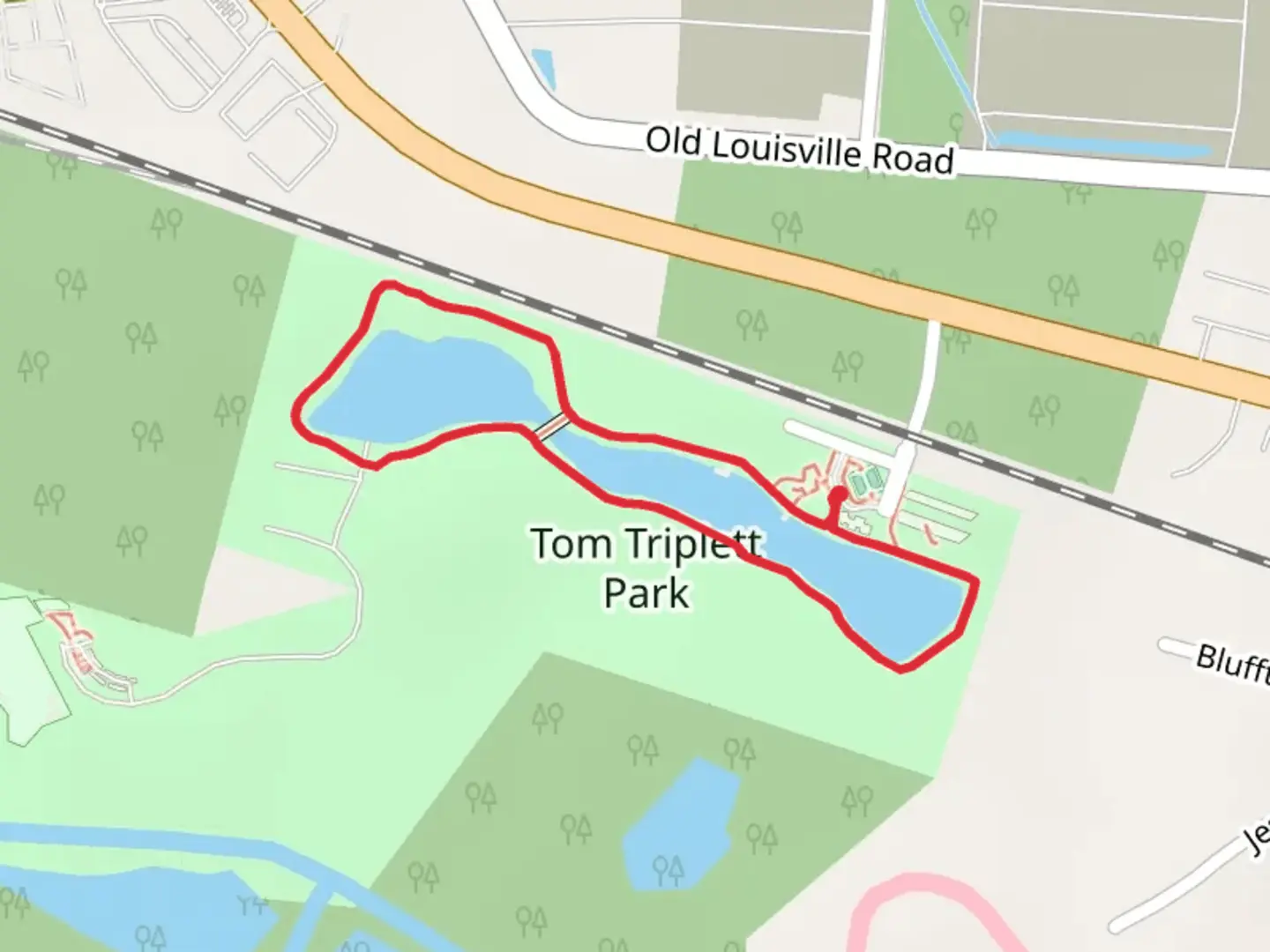 An image depicting the trail Tom Triplett Park Loop and its surrounding area.
