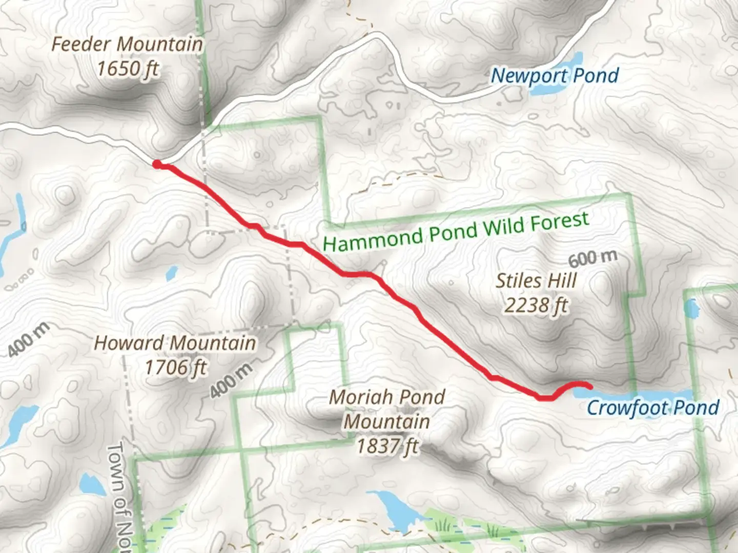 An image depicting the trail Crowfoot Pond Trail and its surrounding area.