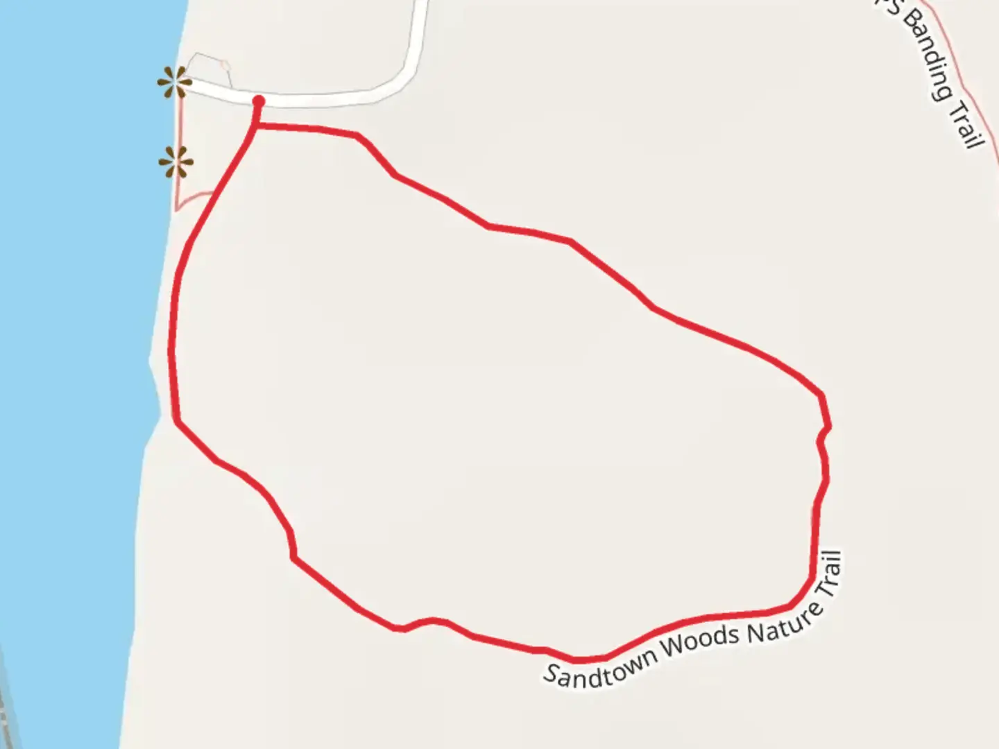 An image depicting the trail Sandtown Woods Nature Loop and its surrounding area.