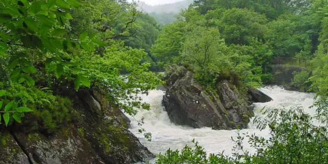 An image depicting the trail Kilmahog Loop via Falls of Leny and its surrounding area.