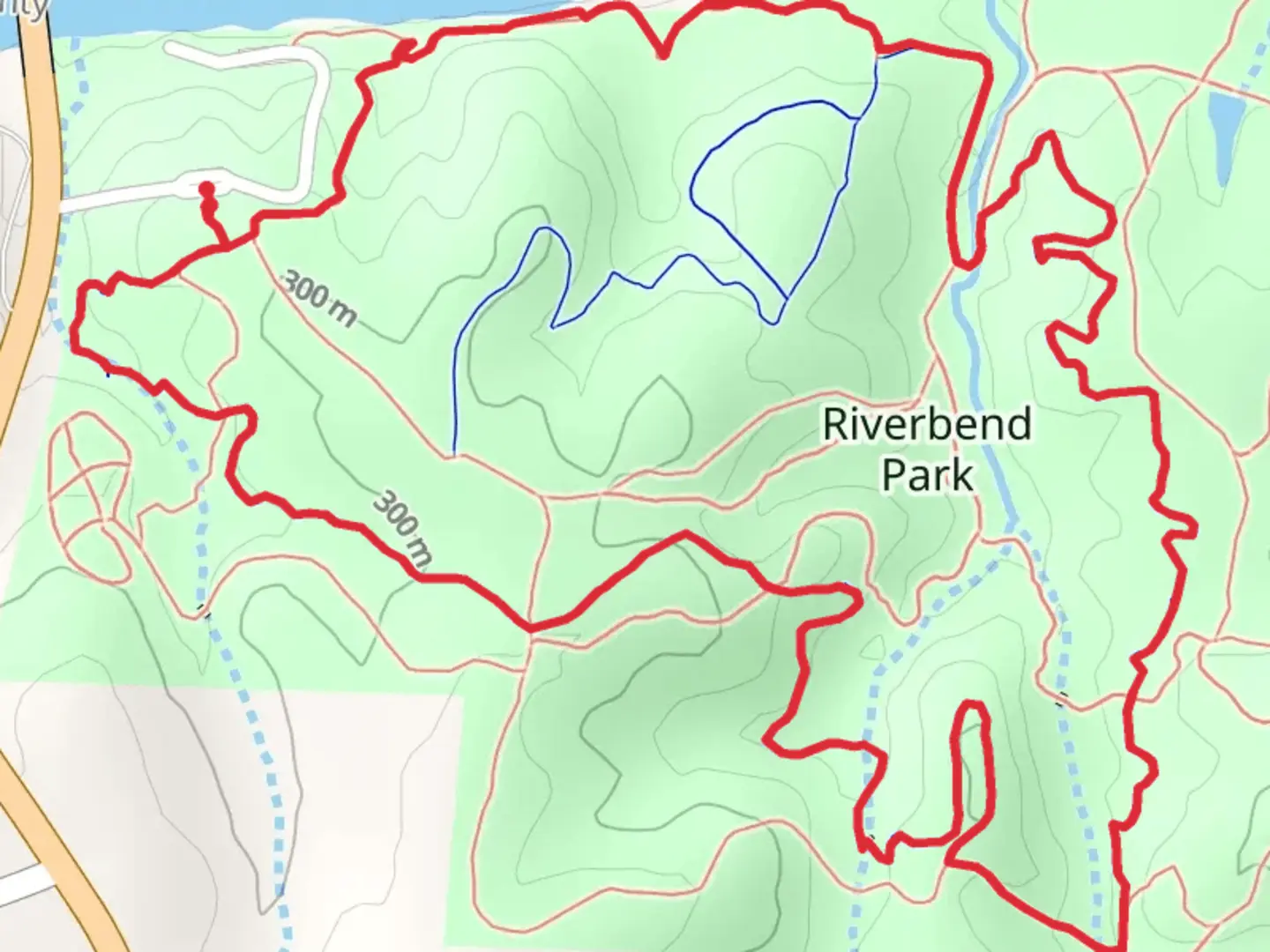 An image depicting the trail Red and Blue Trail Loop - Riverbend Park and its surrounding area.