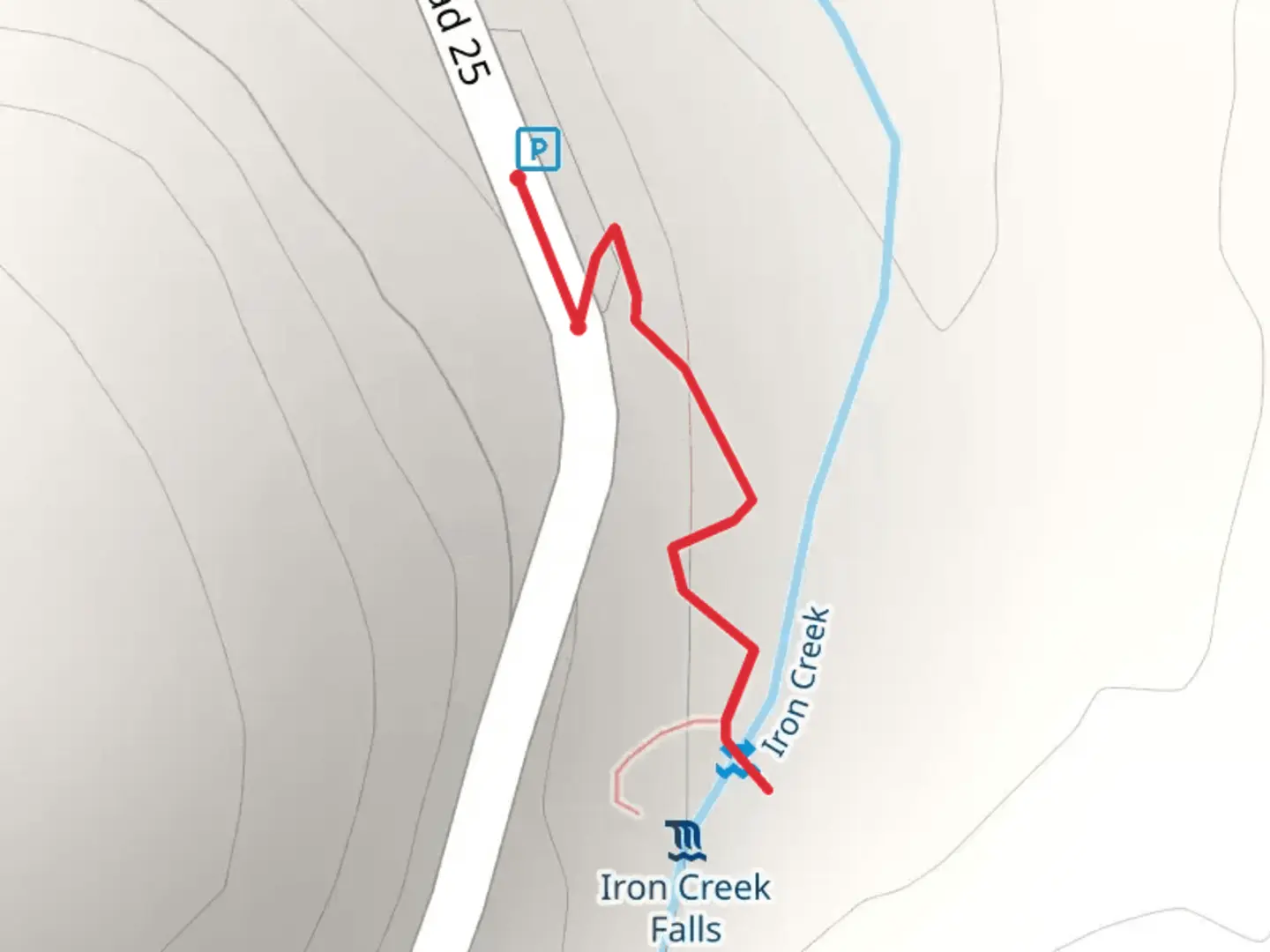 An image depicting the trail Iron Creek Falls and its surrounding area.