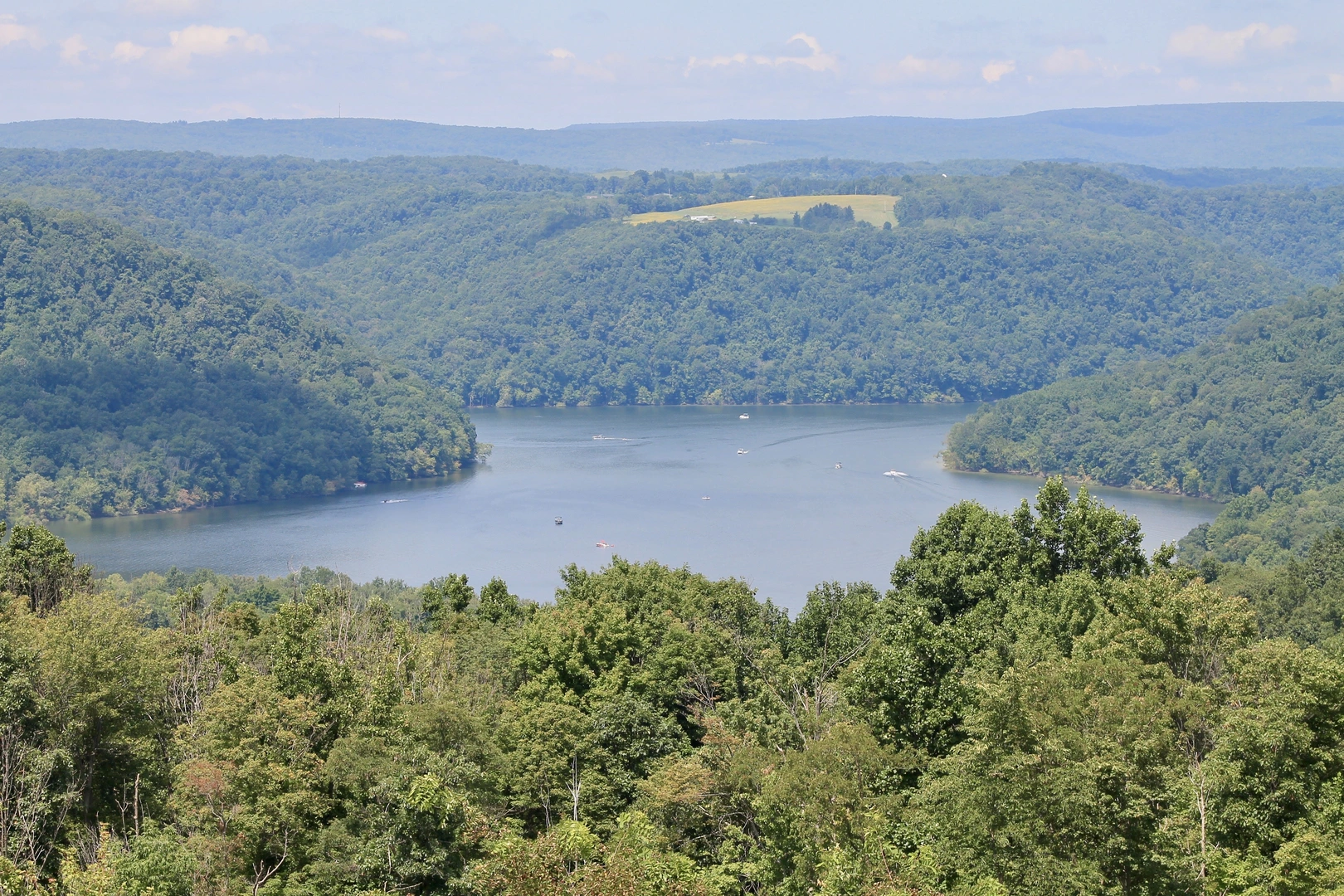 An image depicting the trail Confluence to Fort Hill via Great Allegheny Passage and its surrounding area.