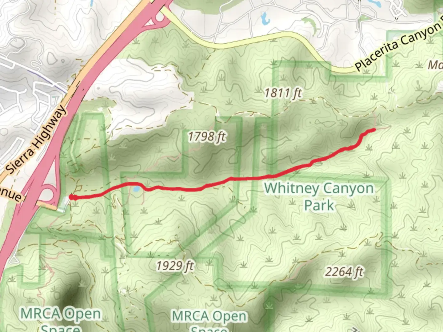 An image depicting the trail Whitney Canyon Road and its surrounding area.