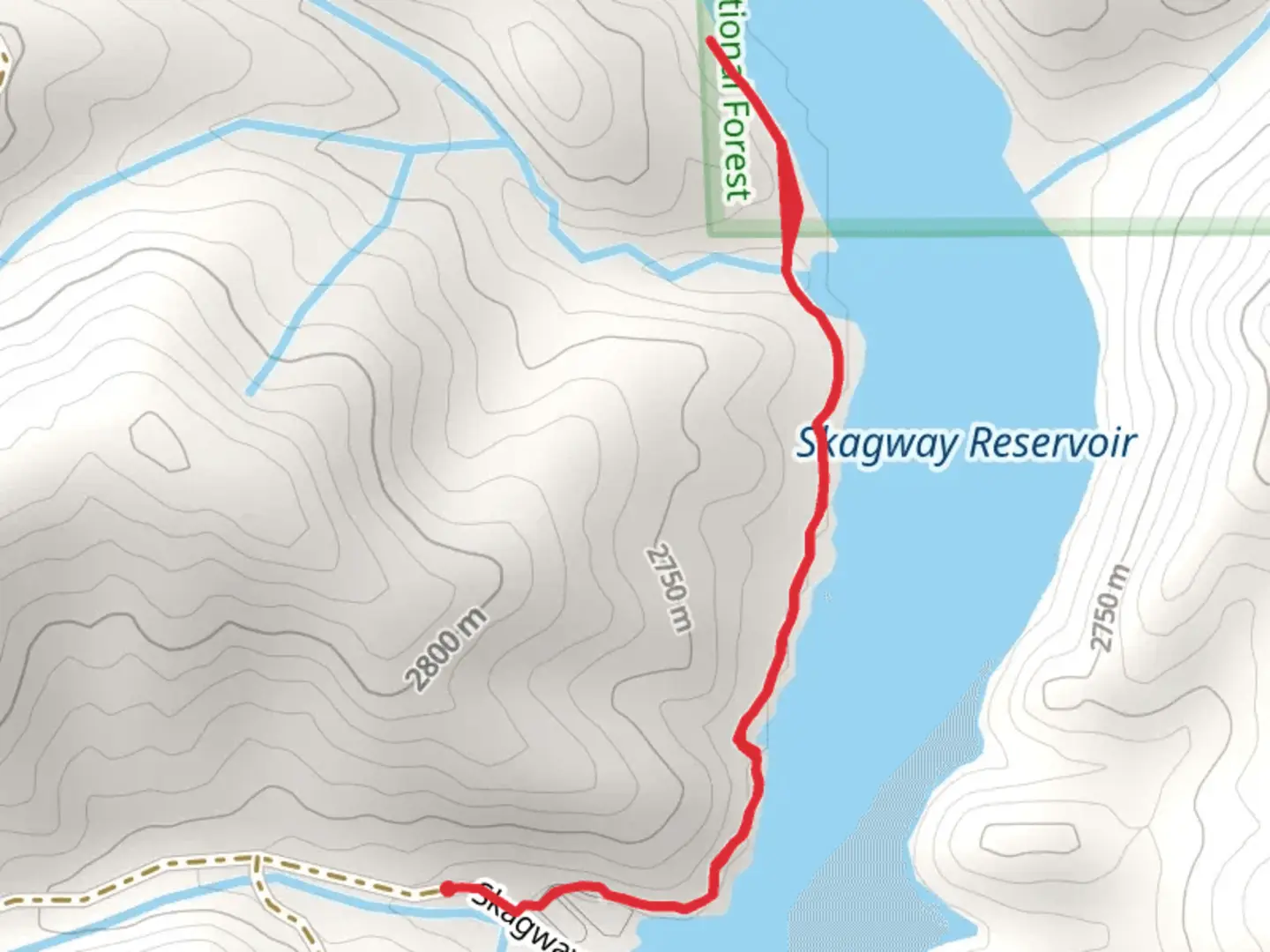 An image depicting the trail Skagway Reservoir and its surrounding area.